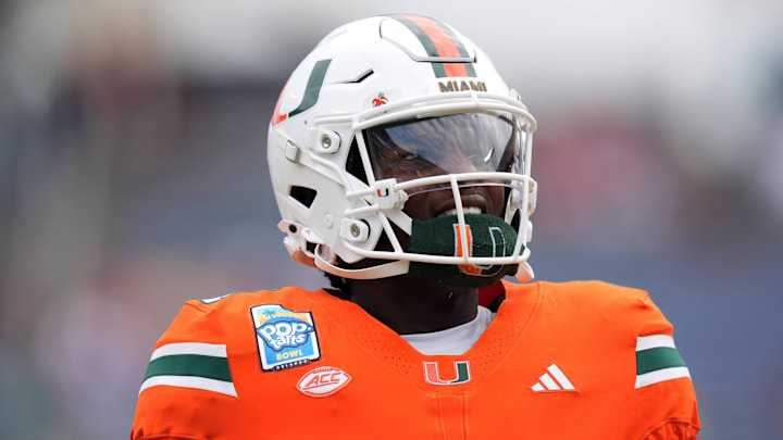 Dec 28, 2024; Orlando, FL, USA; Miami Hurricanes quarterback Cam Ward (1) warms up prior to the game against the Iowa State Cyclones at Camping World Stadium. Mandatory Credit: Jasen Vinlove-Imagn Images