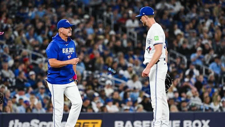 May 10, 2026; Toronto, Ontario, CAN; Toronto Blue Jays starting pitcher Eric Lauer (56) has a discussion with pitching coach Pete Walker (40) against the Los Angeles Angels in the fifth inning at Rogers Centre. Mandatory Credit: David Kirouac-Imagn Images
