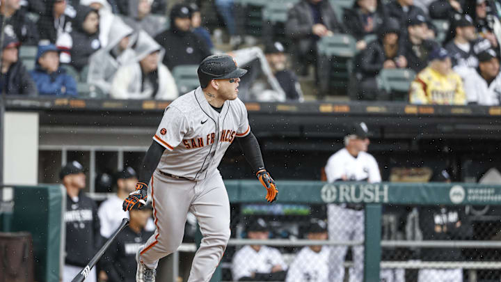 Apr 3, 2023; Chicago, Illinois, USA; San Francisco Giants catcher Roberto Perez (1) watches his RBI-single against the Chicago White Sox during the second inning at Guaranteed Rate Field. Mandatory Credit: Kamil Krzaczynski-Imagn Images Apr 3, 2023; Chicago, Illinois, USA; San Francisco Giants catcher Roberto Perez (1) watches his RBI-single against the Chicago White Sox during the second inning at Guaranteed Rate Field. Mandatory Credit: Kamil Krzaczynski-Imagn Images