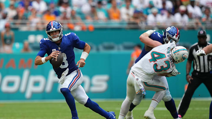 Oct 8, 2023; Miami Gardens, Florida, USA; New York Giants quarterback Daniel Jones (8) scrambles