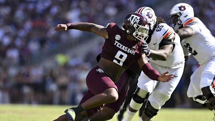 Sep 27, 2025; College Station, Texas, USA; Texas A&M Aggies defensive end Cashius Howell (9) defends in coverage against the Auburn Tigers during the first half at Kyle Field. Mandatory Credit: Maria Lysaker-Imagn Images 
