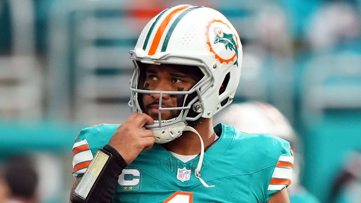 Dec 24, 2023; Miami Gardens, Florida, USA; Miami Dolphins quarterback Tua Tagovailoa (1) walks on the field prior to the game against the Dallas Cowboys at Hard Rock Stadium. Mandatory Credit: Jasen Vinlove-USA TODAY Sports