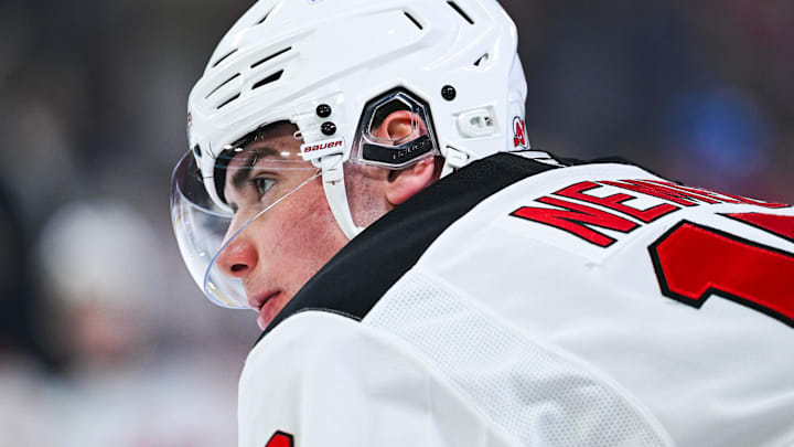 Apr 5, 2026; Montreal, Quebec, CAN; New Jersey Devils defenseman Simon Nemec (17) looks on during warm-up before the game against the Montreal Canadiens at Bell Centre. 