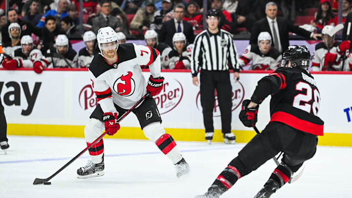 Jan 31, 2026; Ottawa, Ontario, CAN; New Jersey Devils defenseman Dougie Hamilton (7) plays the puck against New Jersey Devils right wing Timo Meier (28) during the second period at Canadian Tire Centre. Mandatory Credit: David Kirouac-Imagn Images