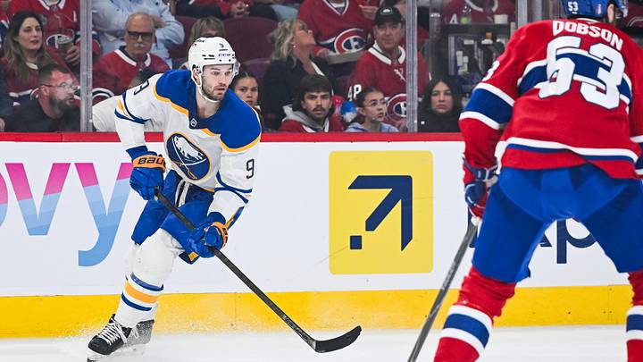 May 16, 2026; Montreal, Quebec, CAN; Buffalo Sabres center Josh Norris (9) plays the puck against Montreal Canadiens defenseman Noah Dobson (53) during the second period in game six of the second round of the 2026 Stanley Cup Playoffs at Bell Centre. Mandatory Credit: David Kirouac-Imagn Images