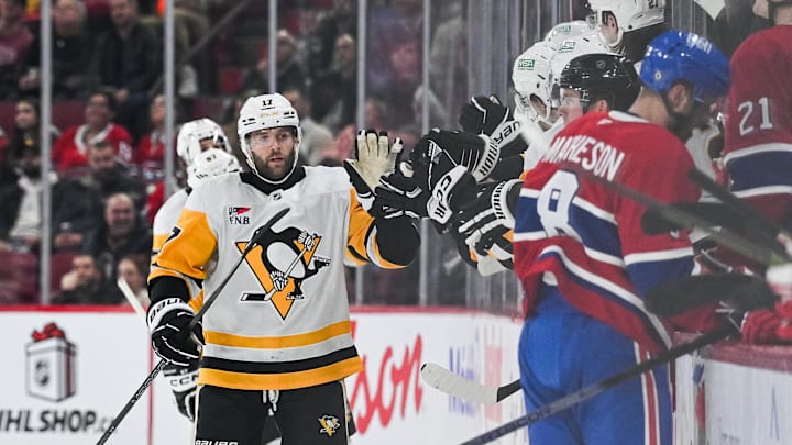 Dec 12, 2024; Montreal, Quebec, CAN; Pittsburgh Penguins right wing Bryan Rust (17) celebrates his second goal of the game with his teammates at the bench against the Montreal Canadiens during the second period at Bell Centre. Mandatory Credit: David Kirouac-Imagn Images