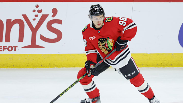 Dec 17, 2024; Chicago, Illinois, USA; Chicago Blackhawks center Connor Bedard (98) looks to pass the puck against the Washington Capitals during the second period at United Center. Mandatory Credit: Kamil Krzaczynski-Imagn Images Dec 17, 2024; Chicago, Illinois, USA; Chicago Blackhawks center Connor Bedard (98) looks to pass the puck against the Washington Capitals during the second period at United Center. Mandatory Credit: Kamil Krzaczynski-Imagn Images