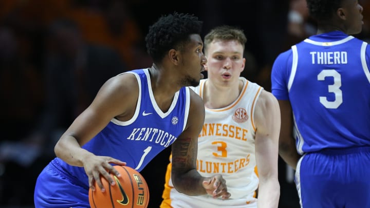 Mar 9, 2024; Knoxville, Tennessee, USA; Kentucky Wildcats guard Justin Edwards (1) moves the ball against Tennessee Volunteers guard Dalton Knecht (3) during the first half at Thompson-Boling Arena at Food City Center. Mandatory Credit: Randy Sartin-USA TODAY Sports