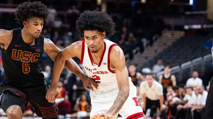 Mar 12, 2025; Indianapolis, IN, USA; Rutgers Scarlet Knights guard Dylan Harper (2) dribbles the ball while USC Trojans guard Wesley Yates III (6) defends in the second half at Gainbridge Fieldhouse. Mandatory Credit: Trevor Ruszkowski-Imagn Images Mar 12, 2025; Indianapolis, IN, USA; Rutgers Scarlet Knights guard Dylan Harper (2) dribbles the ball while USC Trojans guard Wesley Yates III (6) defends in the second half at Gainbridge Fieldhouse. Mandatory Credit: Trevor Ruszkowski-Imagn Images