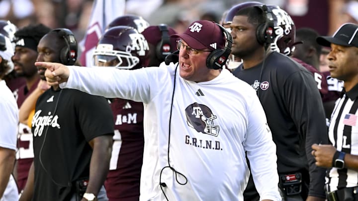 Texas A&M Aggies head coach Mike Elko reacts against the Auburn Tigers during the fourth quarter at Kyle Field. Texas A&M Aggies head coach Mike Elko reacts against the Auburn Tigers during the fourth quarter at Kyle Field.