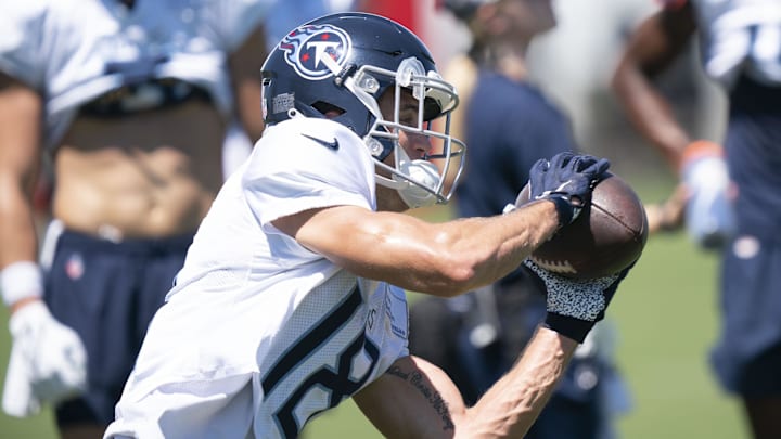 Aug 13, 2022; Nashville, Tennessee;  Tennessee Titans wide receiver Kyle Phillips (18) pulls in a catch during a training camp practice at Ascension Saint Thomas Sports Park.  Mandatory Credit: George Walker IV-Imagn Images