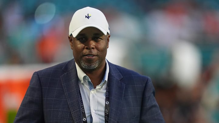 Miami Dolphins general manager Chris Grier walks not the field prior to the game between the Miami Dolphins and the Tennessee Titans at Hard Rock Stadium. 