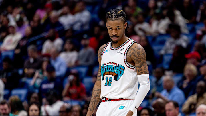 Mar 9, 2025; New Orleans, Louisiana, USA;  Memphis Grizzlies guard Ja Morant (12) looks on against the New Orleans Pelicans during the first half at Smoothie King Center. Mandatory Credit: Stephen Lew-Imagn Images