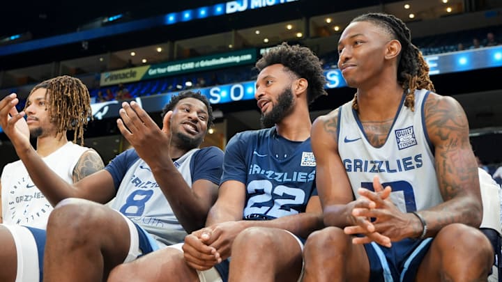 Grizzlies’ Jaren Jackson Jr. (8) talks with Braxton Key (22) and Javon Small (10) on the bench during open practice at the FedExForum on October 4, 2025, in Memphis, Tenn. Grizzlies’ Jaren Jackson Jr. (8) talks with Braxton Key (22) and Javon Small (10) on the bench during open practice at the FedExForum on October 4, 2025, in Memphis, Tenn.