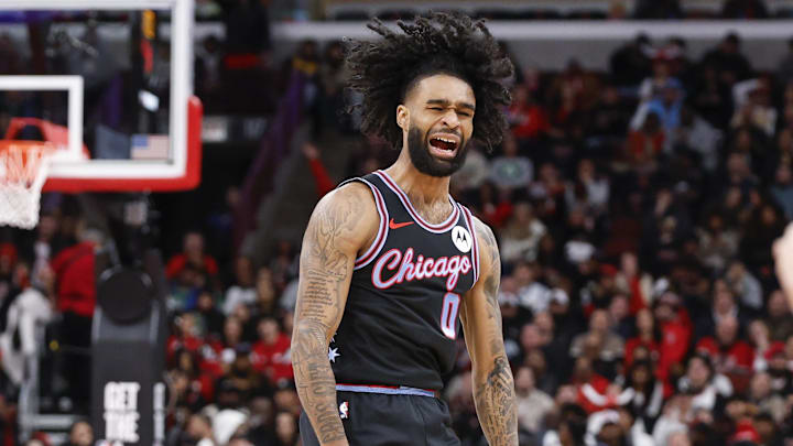 Jan 24, 2026; Chicago, Illinois, USA; Chicago Bulls guard Coby White (0) reacts after scoring against the Boston Celtics during the first half at United Center. Mandatory Credit: Kamil Krzaczynski-Imagn Images