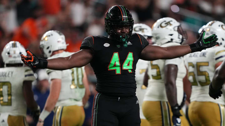 Oct 7, 2023; Miami Gardens, Florida, USA; Miami Hurricanes defensive lineman Rueben Bain Jr. (44) celebrates his sack against the Georgia Tech Yellow Jackets in the second half at Hard Rock Stadium. Mandatory Credit: Jasen Vinlove-USA TODAY Sports Oct 7, 2023; Miami Gardens, Florida, USA; Miami Hurricanes defensive lineman Rueben Bain Jr. (44) celebrates his sack against the Georgia Tech Yellow Jackets in the second half at Hard Rock Stadium. Mandatory Credit: Jasen Vinlove-USA TODAY Sports