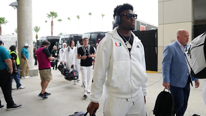 Dec 28, 2024; Orlando, FL, USA; Miami Hurricanes wide receiver Sam Brown Jr. (11) arrives prior to the game against the Iowa State Cyclones at Camping World Stadium. Mandatory Credit: Jasen Vinlove-Imagn Images