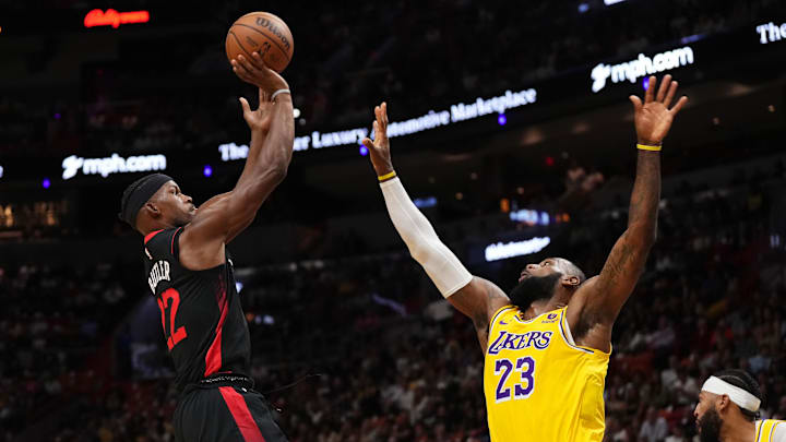 Nov 6, 2023; Miami, Florida, USA; Miami Heat forward Jimmy Butler (22) shoots over Los Angeles Lakers forward LeBron James (23) during the first half at Kaseya Center. Mandatory Credit: Jasen Vinlove-Imagn Images Nov 6, 2023; Miami, Florida, USA; Miami Heat forward Jimmy Butler (22) shoots over Los Angeles Lakers forward LeBron James (23) during the first half at Kaseya Center. Mandatory Credit: Jasen Vinlove-Imagn Images