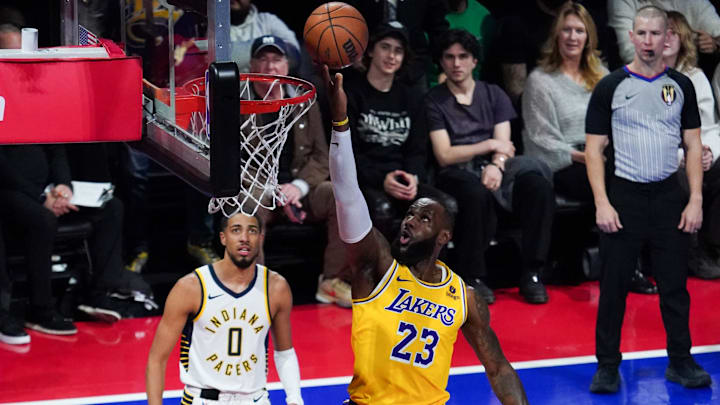 December 9, 2023; Las Vegas, Nevada, USA; Los Angeles Lakers forward LeBron James (23) shoots the basketball against Indiana Pacers guard Tyrese Haliburton (0) during the first quarter of the in-season tournament championship at T-Mobile Arena. Mandatory Credit: Kyle Terada-Imagn Images December 9, 2023; Las Vegas, Nevada, USA; Los Angeles Lakers forward LeBron James (23) shoots the basketball against Indiana Pacers guard Tyrese Haliburton (0) during the first quarter of the in-season tournament championship at T-Mobile Arena. Mandatory Credit: Kyle Terada-Imagn Images