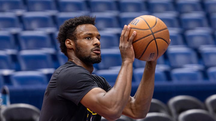 Nov 14, 2025; New Orleans, Louisiana, USA; Los Angeles Lakers guard Bronny James (9) warms up before the game against the New Orleans Pelicans at Smoothie King Center. Mandatory Credit: Stephen Lew-Imagn Images Nov 14, 2025; New Orleans, Louisiana, USA; Los Angeles Lakers guard Bronny James (9) warms up before the game against the New Orleans Pelicans at Smoothie King Center. Mandatory Credit: Stephen Lew-Imagn Images