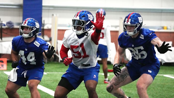New York Giants linebacker Abdul Carter (51) participates in rookie minicamp with fellow draft picks Cam Skattebo and Thomas Fidone II.