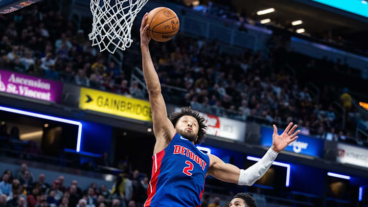 Jan 29, 2025; Indianapolis, Indiana, USA; Detroit Pistons guard Cade Cunningham (2) rebounds the ball in the first half against the Indiana Pacers at Gainbridge Fieldhouse. Mandatory Credit: Trevor Ruszkowski-Imagn Images