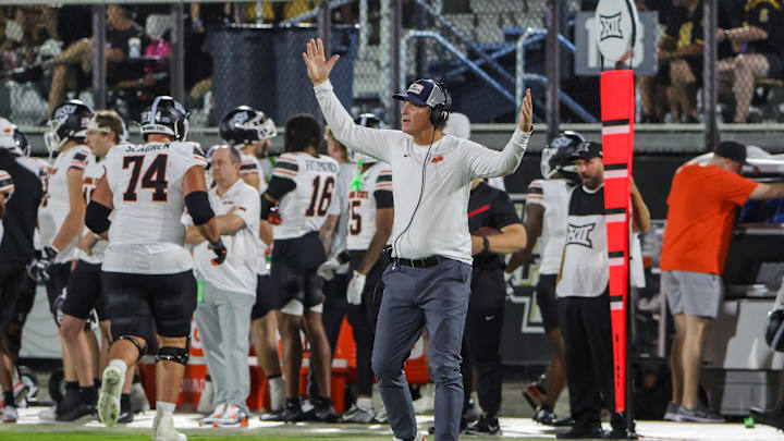 Nov 22, 2025; Orlando, Florida, USA; Oklahoma State Cowboys head coach Doug Meacham reacts during the second half against the UCF Knights at Acrisure Bounce House. Mandatory Credit: Mike Watters-Imagn Images