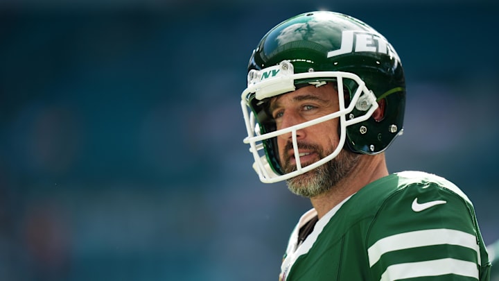 Dec 8, 2024; Miami Gardens, Florida, USA; New York Jets quarterback Aaron Rodgers (8) warms up prior to the game against the Miami Dolphins at Hard Rock Stadium. Mandatory Credit: Jasen Vinlove-Imagn Images