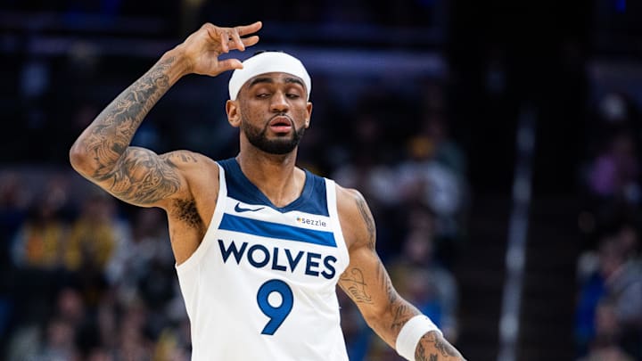 Mar 24, 2025; Indianapolis, Indiana, USA;Minnesota Timberwolves guard Nickeil Alexander-Walker (9) celebrates a made basket in the first half against the Indiana Pacers at Gainbridge Fieldhouse. Mandatory Credit: Trevor Ruszkowski-Imagn Images