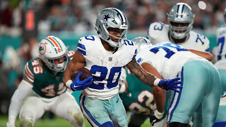 Dec 24, 2023; Miami Gardens, Florida, USA; Dallas Cowboys running back Tony Pollard (20) runs the ball against the Miami Dolphins during the second half at Hard Rock Stadium. Mandatory Credit: Jasen Vinlove-USA TODAY Sports