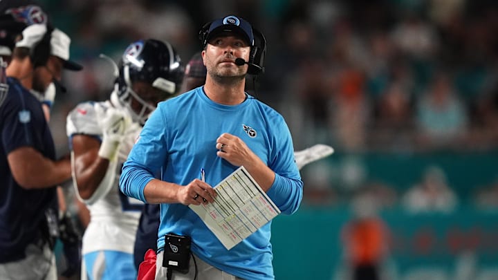 Sep 30, 2024; Miami Gardens, Florida, USA; Tennessee Titans head coach Brian Callahan looks up at the video board during the first half against the Miami Dolphins at Hard Rock Stadium.