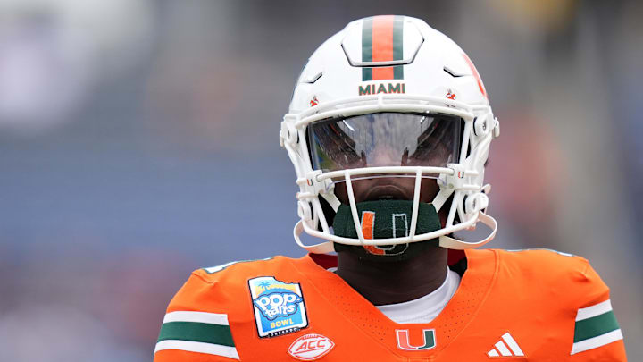 Miami Hurricanes quarterback Cam Ward (1) warms up prior to the game against the Iowa State Cyclones Miami Hurricanes quarterback Cam Ward (1) warms up prior to the game against the Iowa State Cyclones
