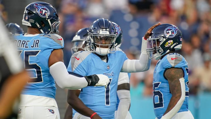 Tennessee Titans quarterback Cam Ward (1) gets into position for the first play of the pre-season game against the Minnesota Vikings at Nissan Stadium in Nashville, Tenn., Friday, Aug. 22, 2025.