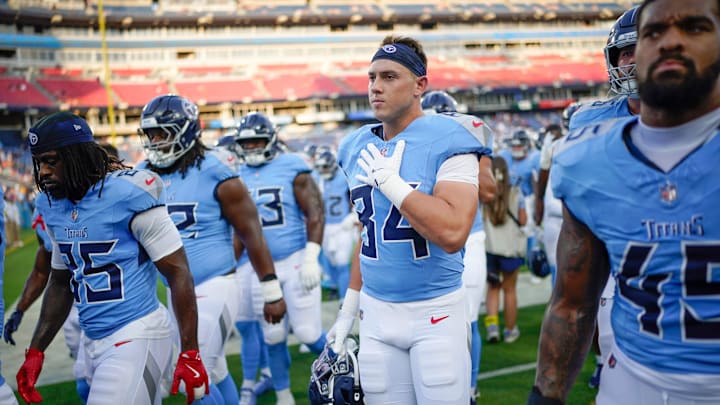 Tennessee Titans tight end Gunnar Helm (84) comes off the field after warmups before an NFL pre-season game against the Minnesota Vikings at Nissan Stadium in Nashville, Tenn., Friday, Aug. 22, 2025.