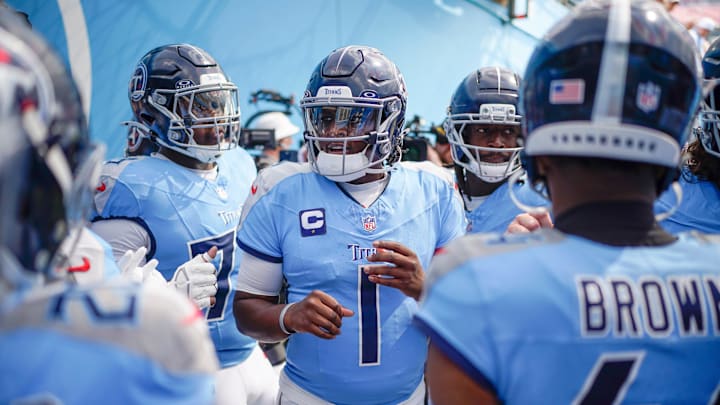 Tennessee Titans quarterback Cam Ward huddles up with teammates before taking the field against the Indianapolis Colts.