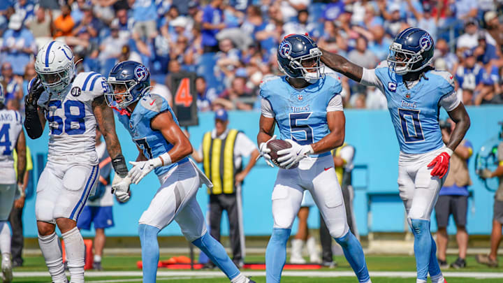 Tennessee Titans wide receiver Elic Ayomanor (5) celebrates his touchdown with wide receiver Calvin Ridley (0) during the fourth quarter against the Indianapolis Colts at Nissan Stadium in Nashville, Tenn., Sunday, Sept. 21, 2025. Tennessee Titans wide receiver Elic Ayomanor (5) celebrates his touchdown with wide receiver Calvin Ridley (0) during the fourth quarter against the Indianapolis Colts at Nissan Stadium in Nashville, Tenn., Sunday, Sept. 21, 2025.