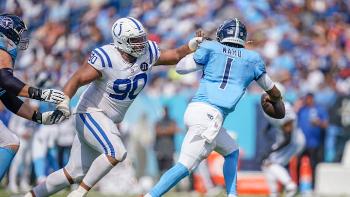 Indianapolis Colts defensive tackle Grover Stewart (90) pressures Tennessee Titans quarterback Cam Ward (1) during the third quarter at Nissan Stadium in Nashville, Tenn., Sunday, Sept. 21, 2025.