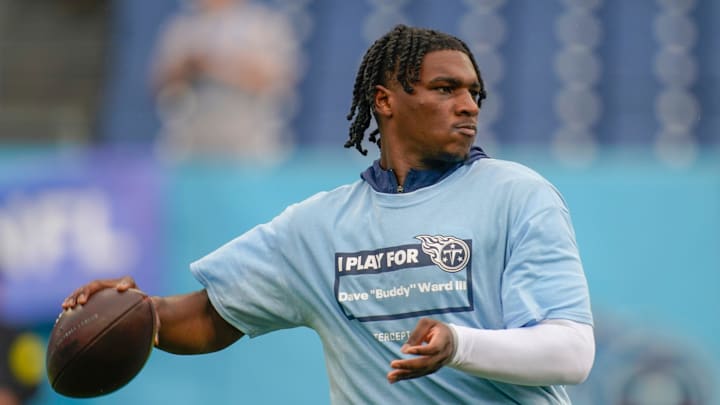 Tennessee Titans quarterback Cam Ward (1) warms up before the game against the New England Patriots at Nissan Stadium in Nashville, Tenn., Sunday, Oct. 19, 2025.