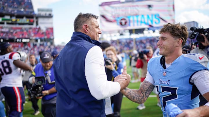 New England Patriots coach Mike Vrabel shakes hands with Tennessee Titans wide receiver Mason Kinsey (12) after the game at Nissan Stadium in Nashville, Tenn., Sunday, Oct. 19, 2025.