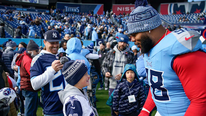 Colton Ehrhardt, 9, meets Tennessee Titans defensive tackle Jeffery Simmons (98) before the game against the Jacksonville Jaguars at Nissan Stadium in Nashville, Tenn., Sunday, Nov. 30, 2025. Colton Ehrhardt, 9, meets Tennessee Titans defensive tackle Jeffery Simmons (98) before the game against the Jacksonville Jaguars at Nissan Stadium in Nashville, Tenn., Sunday, Nov. 30, 2025.