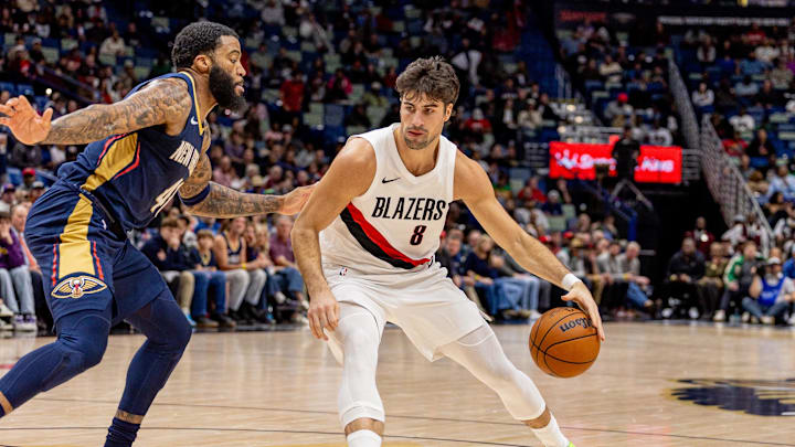 Nov 12, 2025; New Orleans, Louisiana, USA;  Portland Trail Blazers forward Deni Avdija (8) dribbles against New Orleans Pelicans guard/forward Saddiq Bey (41) during the first half at Smoothie King Center. Mandatory Credit: Stephen Lew-Imagn Images