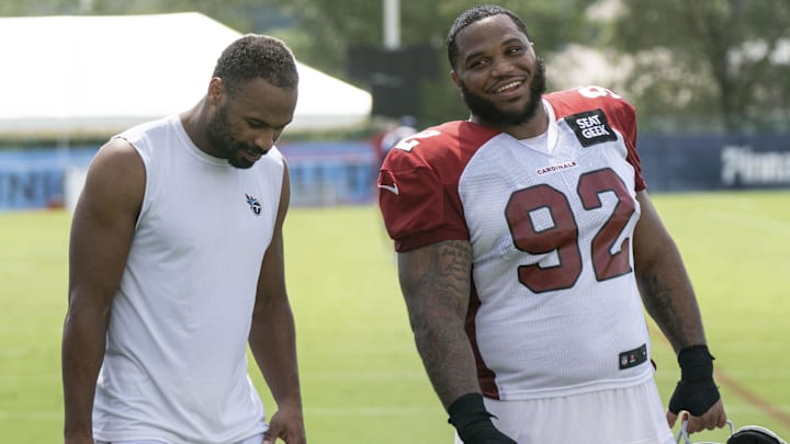 Aug 24, 2022; Nashville, Tennessee;  Tennessee Titans wide receiver Robert Woods (2) visits with Arizona Cardinals defensive tackle Antwaun Woods (92) after a joint training camp practice at Ascension Saint Thomas Sports Park. Mandatory Credit: George Walker IV-Imagn Images