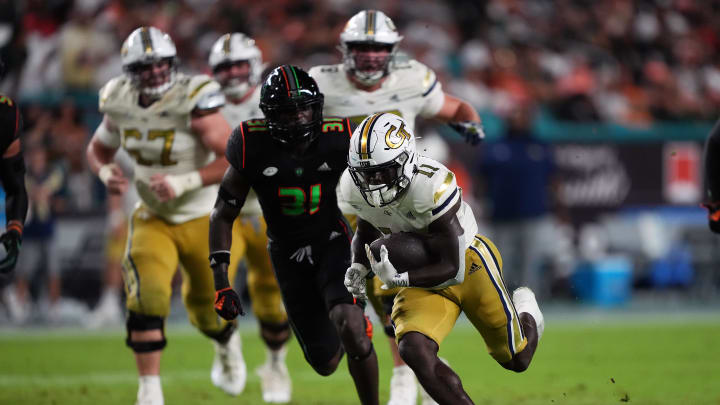 Oct 7, 2023; Miami Gardens, Florida, USA; Georgia Tech Yellow Jackets running back Jamal Haynes (11) runs the ball against the Miami Hurricanes in the second half at Hard Rock Stadium. Mandatory Credit: Jasen Vinlove-USA TODAY Sports