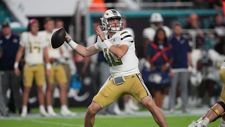 Oct 7, 2023; Miami Gardens, Florida, USA; Georgia Tech Yellow Jackets quarterback Haynes King (10) attempts a pass against the Miami Hurricanes in the first half at Hard Rock Stadium. Mandatory Credit: Jasen Vinlove-Imagn Images