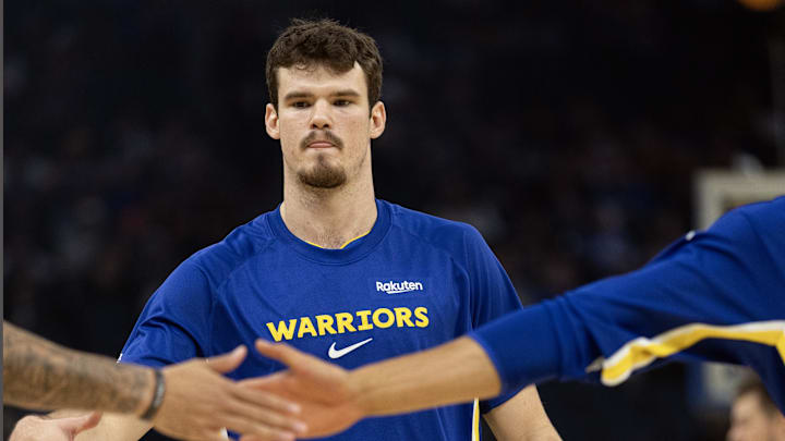 Oct 17, 2025; San Francisco, California, USA; Golden State Warriors center Quinten Post warms up before facing the Los Angeles Clippers at Chase Center. Mandatory Credit: D. Ross Cameron-Imagn Images Oct 17, 2025; San Francisco, California, USA; Golden State Warriors center Quinten Post warms up before facing the Los Angeles Clippers at Chase Center. Mandatory Credit: D. Ross Cameron-Imagn Images