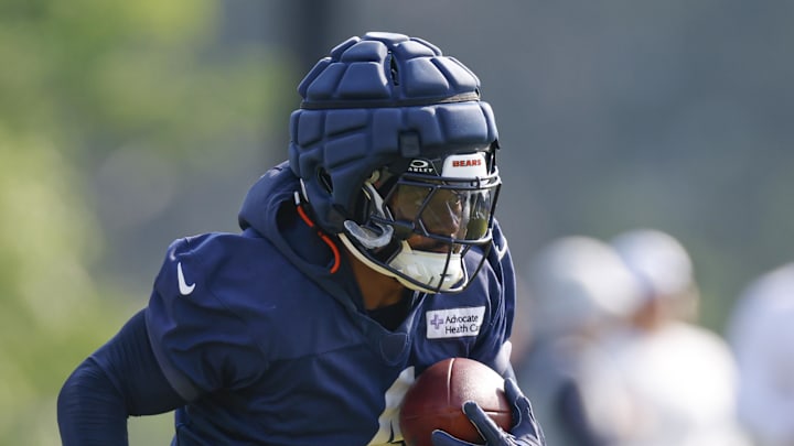 Chicago Bears running back D'Andre Swift runs with the ball during training camp at Halas Hall. Chicago Bears running back D'Andre Swift runs with the ball during training camp at Halas Hall.