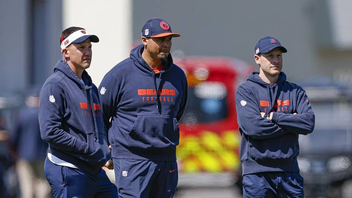 May 9, 2025; Lake Forest, IL, USA; Chicago Bears defensive coordinator Dennis Allen (L), general manager Ryan Poles (C) and head coach Ben Johnson (R) observe during the Rookie Minicamp at Halas Hall. Mandatory Credit: Kamil Krzaczynski-Imagn Images