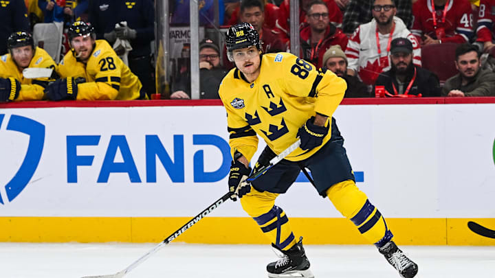 Feb 12, 2025; Montreal, Quebec, CAN; [Imagn Images direct customers only] Team Sweden forward William Nylander (88) plays the puck against Team Canada in overtime during a 4 Nations Face-Off ice hockey game at Bell Centre. Mandatory Credit: David Kirouac-Imagn Images