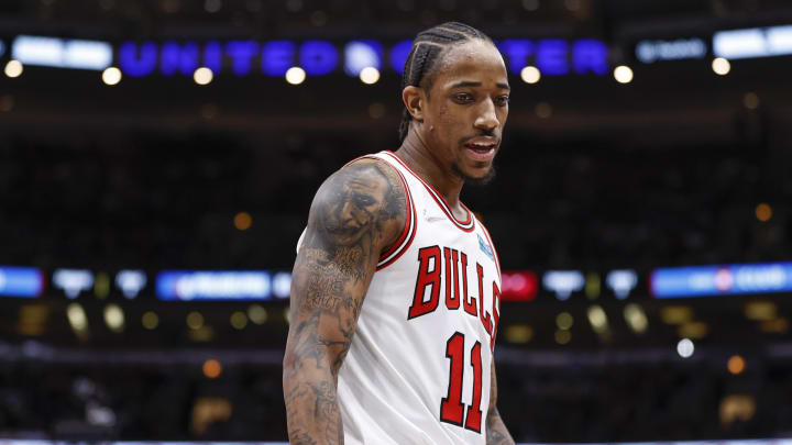 Feb 6, 2022; Chicago, Illinois, USA; Chicago Bulls forward DeMar DeRozan (11) reacts as he walks on the court during the second half of an NBA game against the Philadelphia 76ers at United Center. Mandatory Credit: Kamil Krzaczynski-USA TODAY Sports
