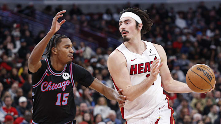 Jan 29, 2026; Chicago, Illinois, USA; Miami Heat forward Jaime Jaquez Jr. (11) drives to the basket against Chicago Bulls forward Julian Phillips (15) during the second half at United Center. Mandatory Credit: Kamil Krzaczynski-Imagn Images